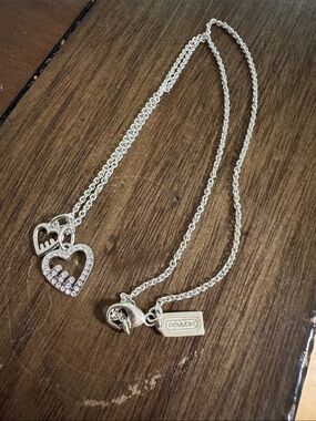 Coach Silver-Tone Double Heart Pendant Necklace with Crystal Accents